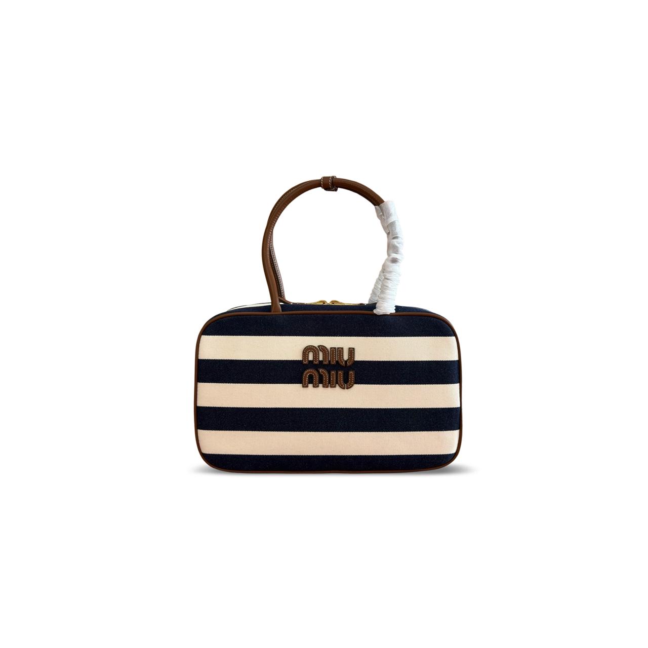 WhatsApp Image 2026-07-06 at 10.04.16 PM MIU MIU BEAU CANVAS BAG (34*23*10cm) - Image 1