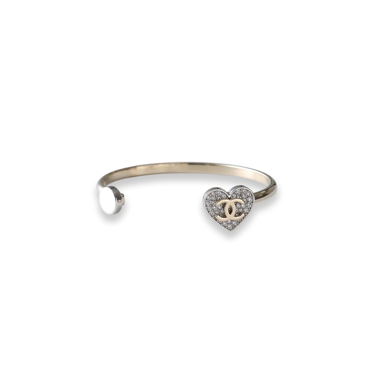 WhatsApp Image 2026-08-03 at 3.51.56 AM CHANEL HEART CUFF BRACELET IN GOLD AND SILVER - Image 1